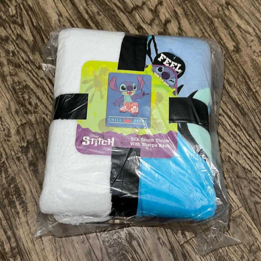 Disney stitch silk touch throw with Sherpa back